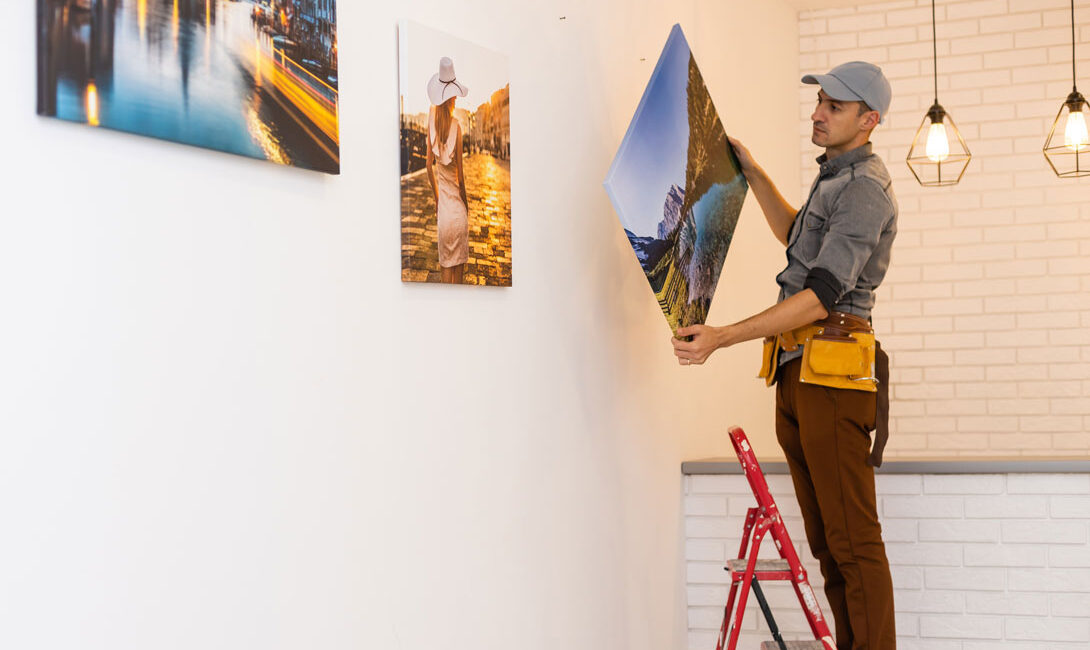 Hanging painting on the wall