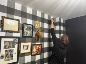 Installing a photo collage on the wall