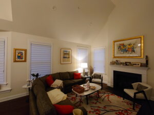 Hanging paintings in the living room.