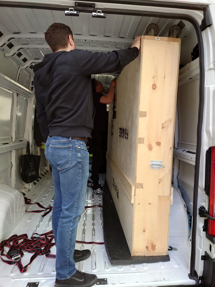 Loading a crate into van
